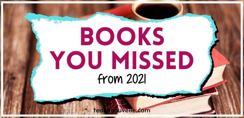 Two books stacked on a wooden table with a cup of coffee on top of the books. There is a white rectangle in the center of the image with pink and black text that reads "Books You Missed from 2021"